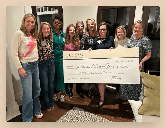 Bloom Members present MBB's grant